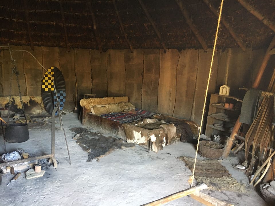 Inside a dwelling at Butser ancient farm near Petersfield.