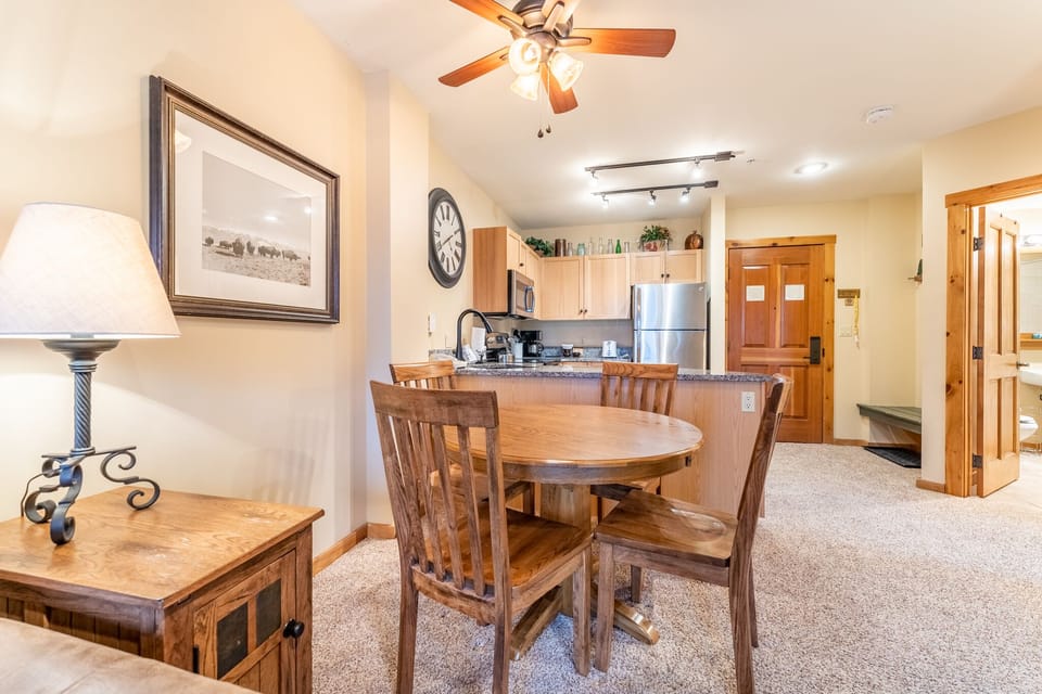 Gather around your own dining table where family meals become cherished memories in this warm, open-concept space.