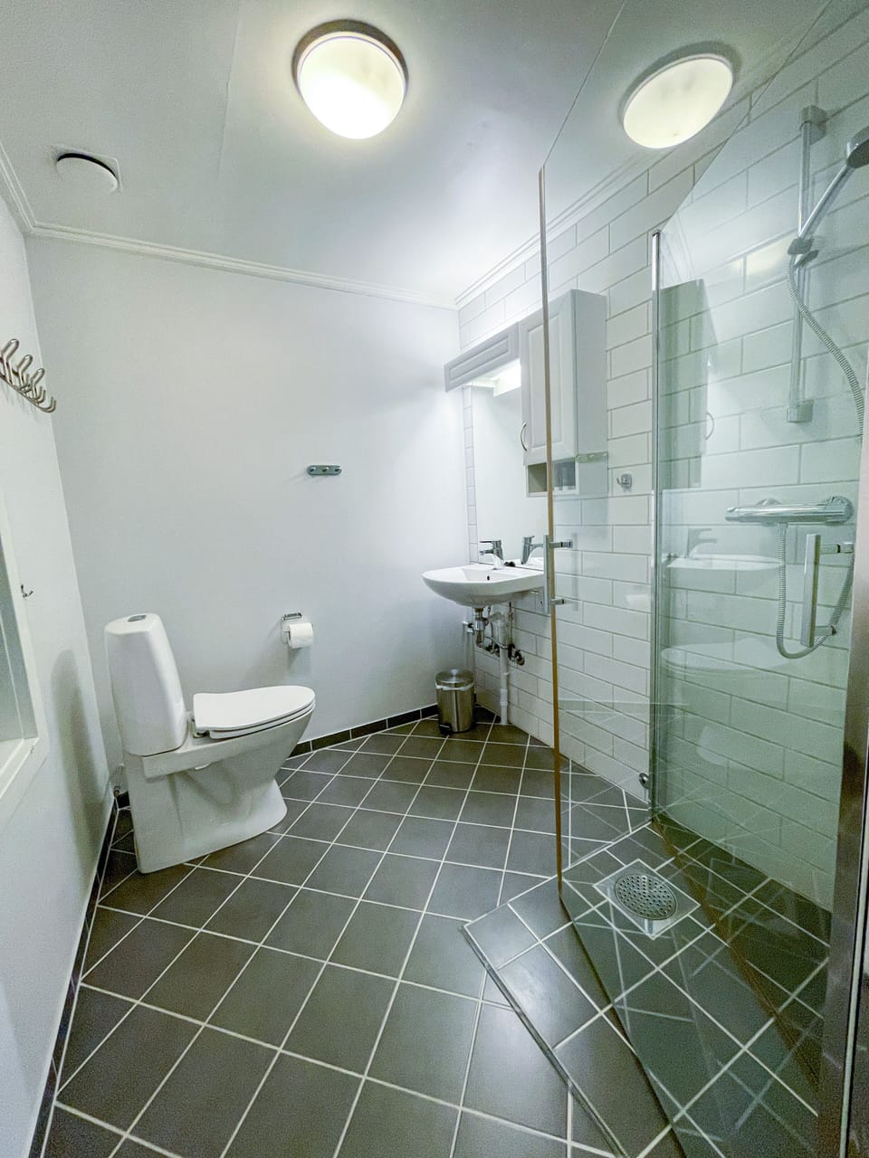 Shower, heated floors (bathroom), towels, soap