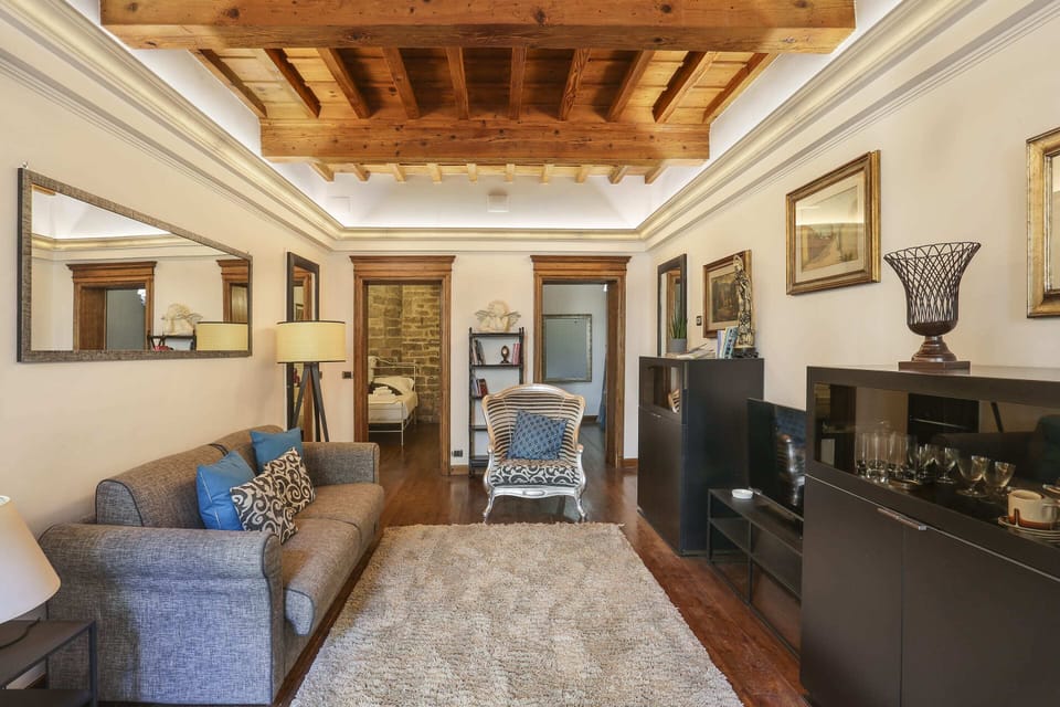 Basic Apartment, Multiple Beds | Living room | Flat-screen TV