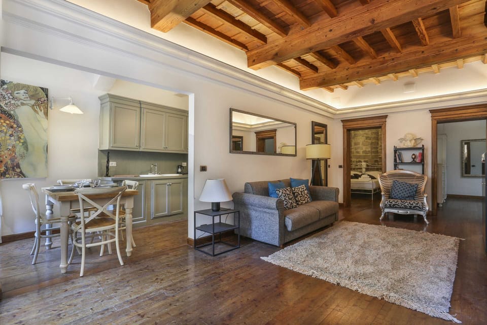Basic Apartment, Multiple Beds | Living room | Flat-screen TV