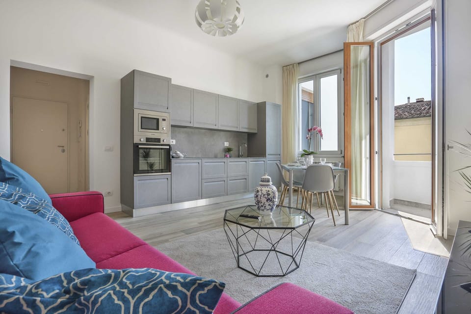 Basic Apartment, Multiple Beds | Living room | TV
