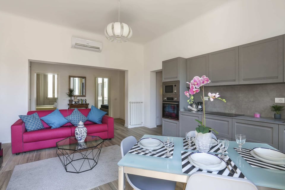 Basic Apartment, Multiple Beds | Living room | TV