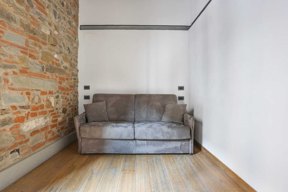 Basic Apartment, Multiple Beds | Living room | TV