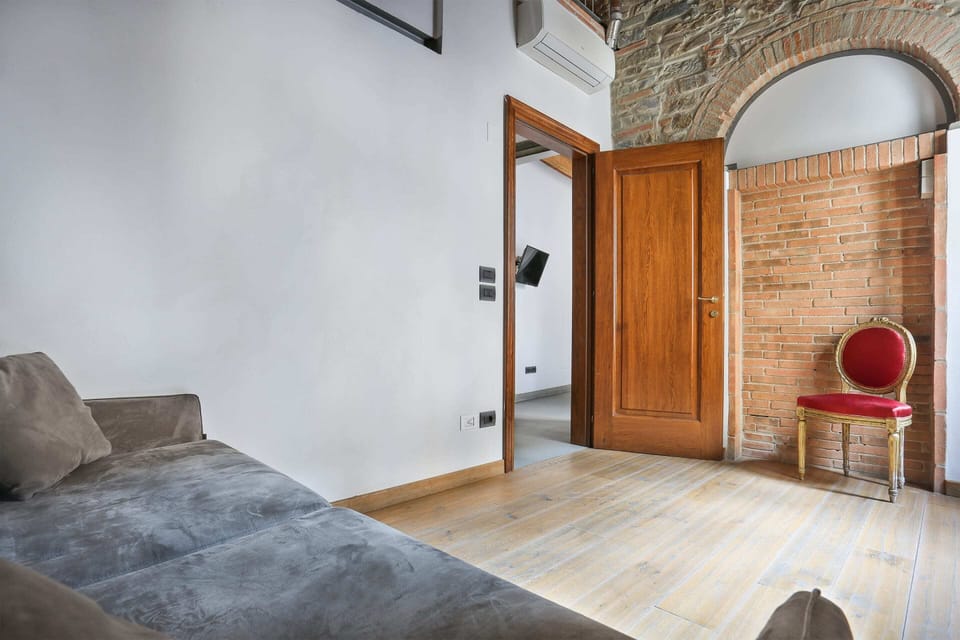 Basic Apartment, Multiple Beds | Living room | TV