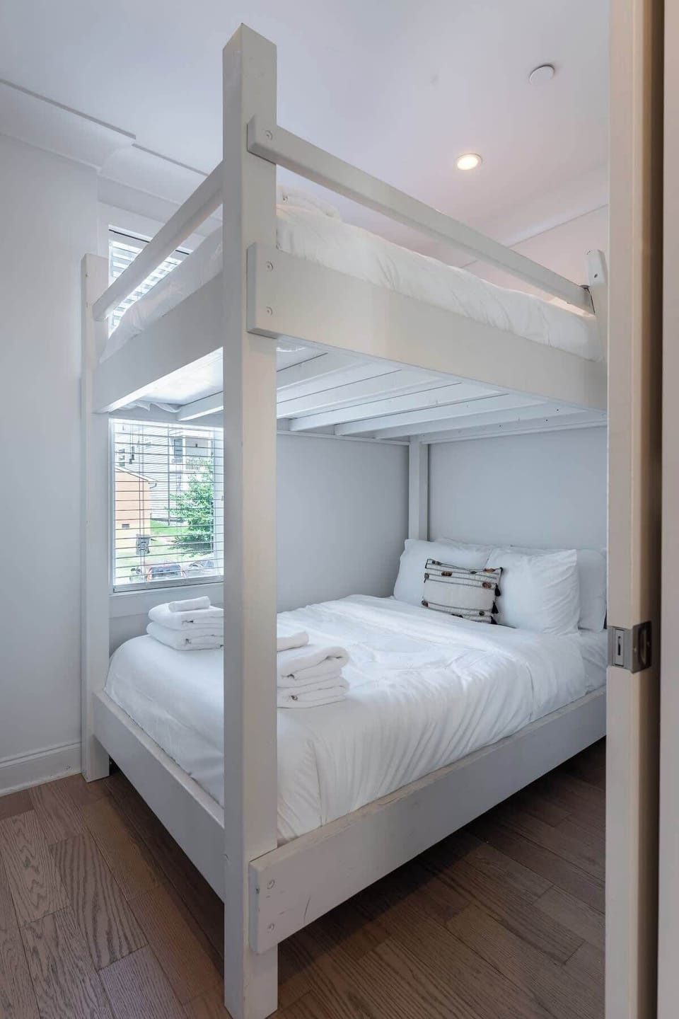 Relax and recharge in this stylish suite with bright natural light and comfy beds!