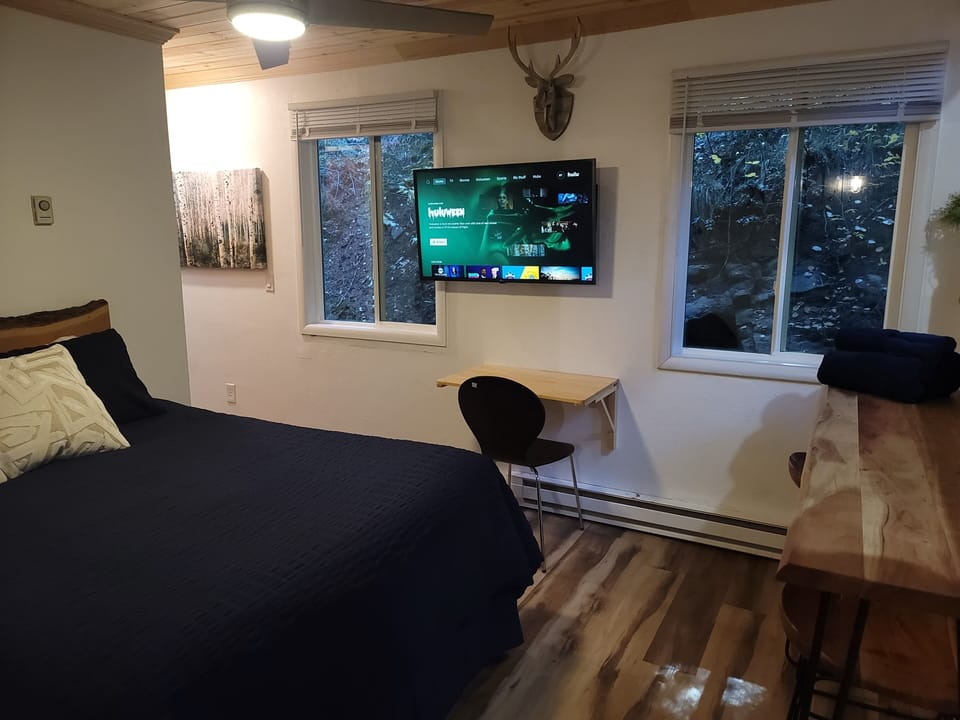 Collapsible desk available if you need a work space, folds down when not in use.