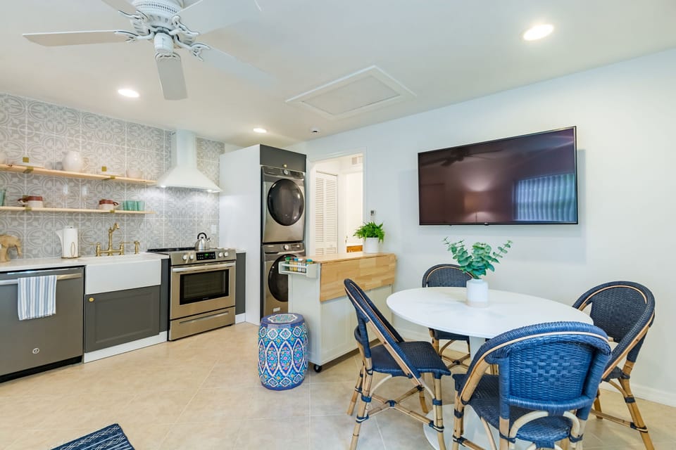 The dining/kitchen area in the cottage. It also has a separate washer and dryer.
