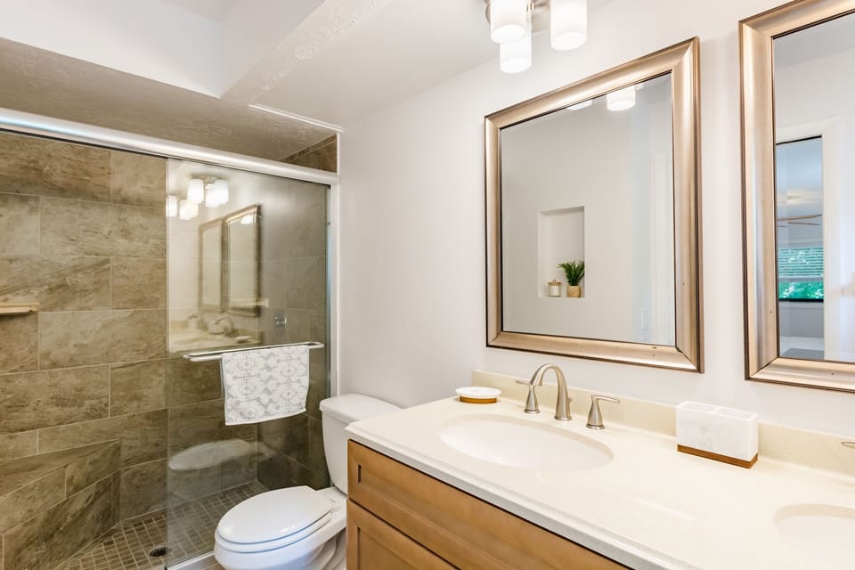 Cave like (in the best way) walk-in shower in the primary bath. 