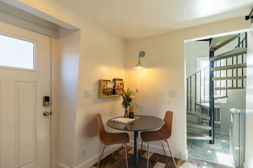 Sweet and cozy breakfast nook doubles as a perfect workspace!