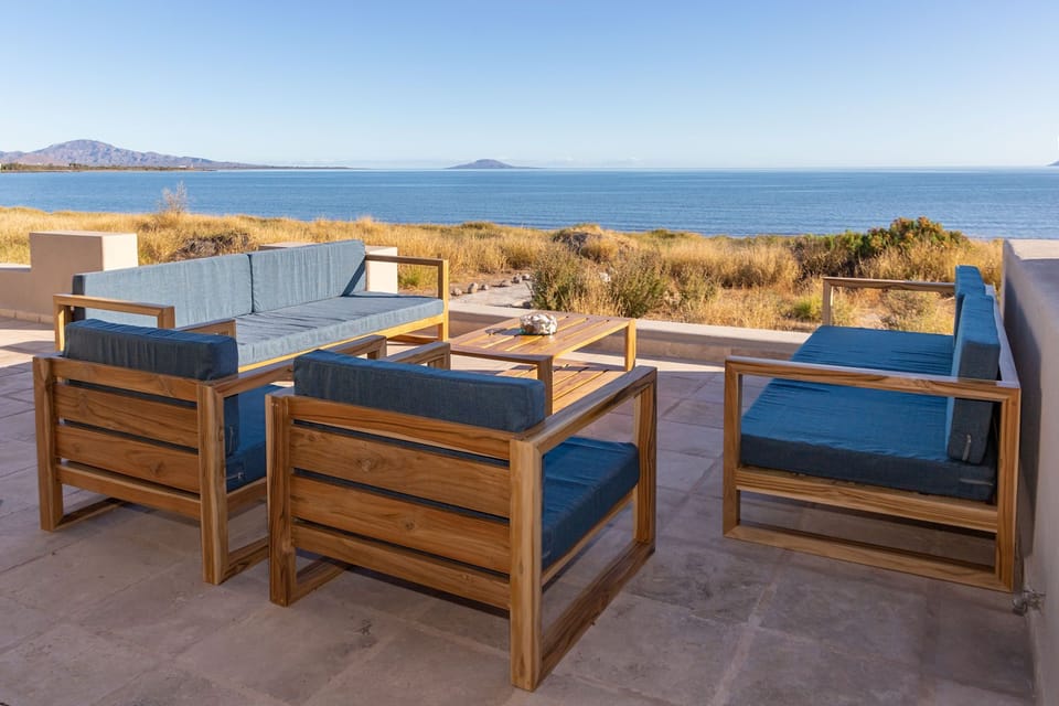 Outdoor teak furniture handcrafted by a local artisan. 