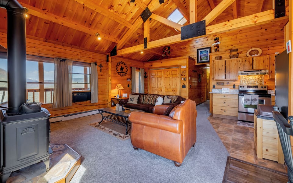 The open floorplan on the main level has plenty of space for your entire group to relax and reconnect
