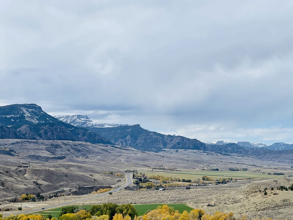 Panoramic views of the Wapiti Valley from this mountain top home.