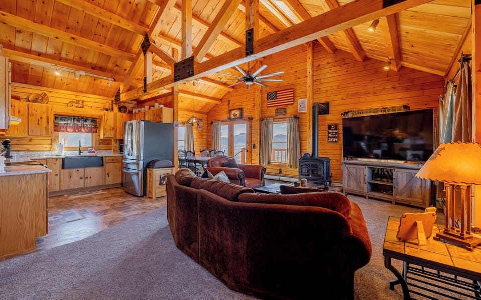 The warmth of natural wood and comfortable furnishings make Aviator's Landing the perfect retreat for families or groups