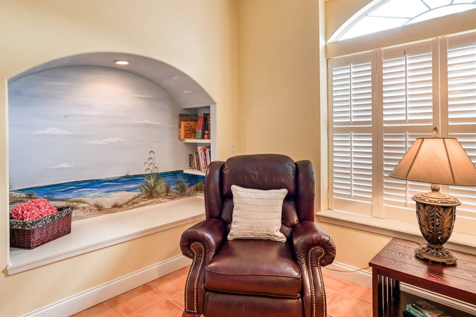 This cozy little nook is perfect for reading a book during a summer rain shower.
