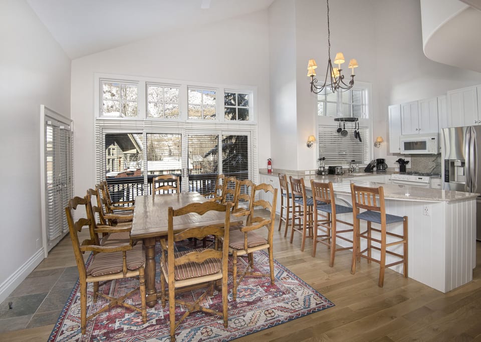 Kitchen with dining area - Open dining area with attached kitchen. Great natural light with big windows.