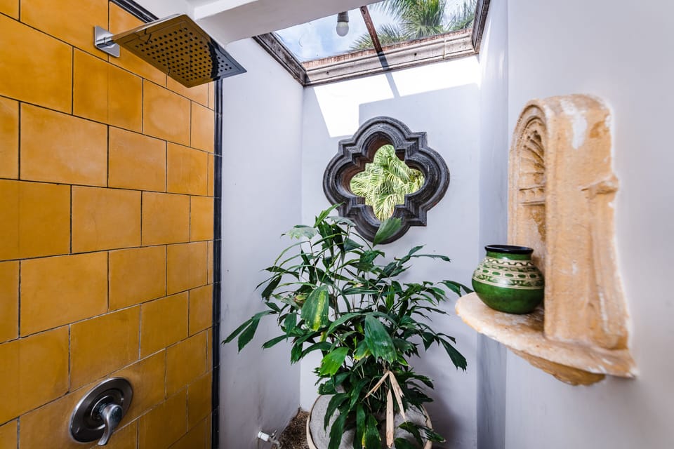Junior Suite Bathroom. - Full bath with an indoor garden and luxury open air shower.