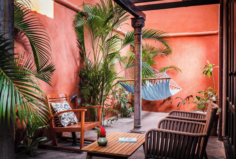 Master Bedroom Private Patio - Surrounded by landscaped gardens and offers a covered terrace and your own hammock to  peaceful getaway.