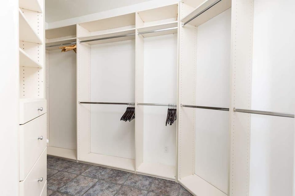 Primary Bedroom walk-in closet