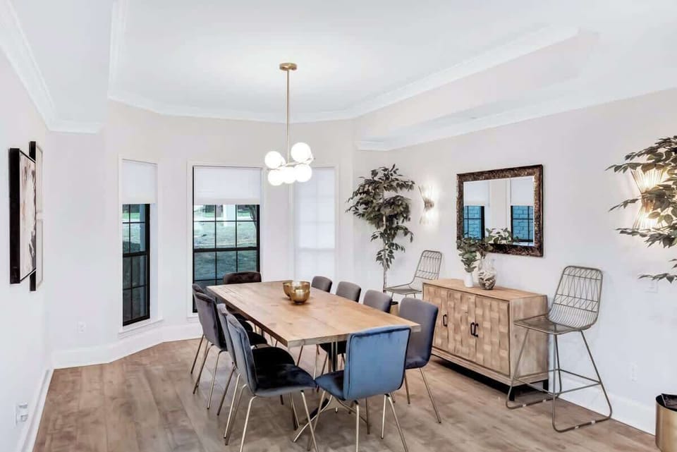 A spacious dining area with seating for the whole group, perfect for shared meals and memorable gatherings.