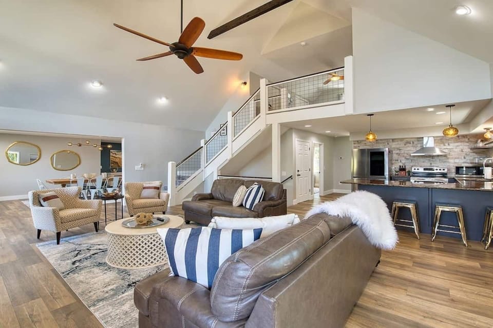 Open living area with stairs to upper level. Breakfast bar seating for 4. 