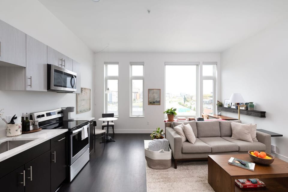 Kick back and relax in our modern living space, featuring flexible seating and a smart TV with Chromecast and Roku