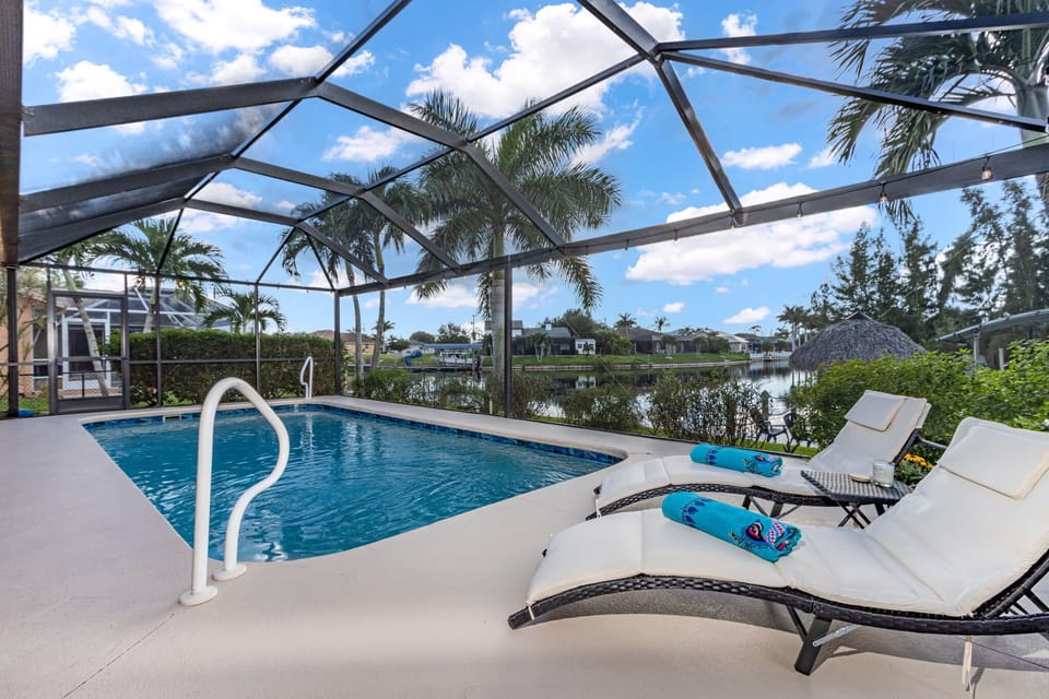 Pool-side view of the beautiful waterway and canal just beyond your private dock