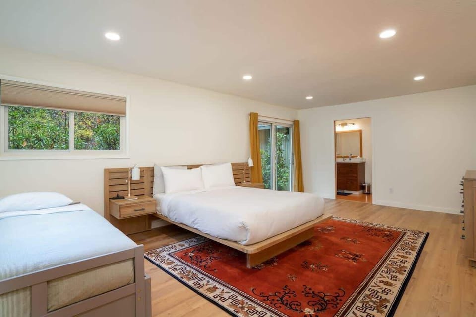 Queen Bedroom with 2-Single Beds(1 is pullout) and Bathroom