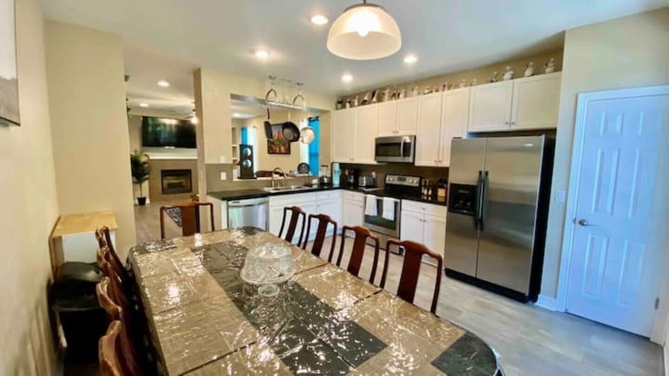 Natural light from the backyard doors.