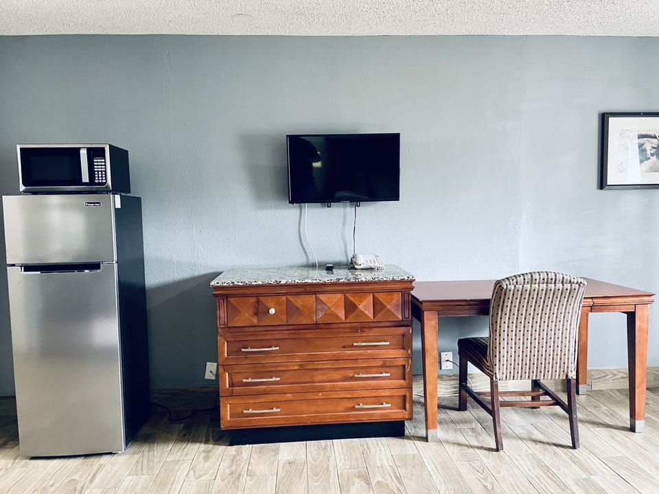 Room, 2 Double Beds | Living area | Smart TV