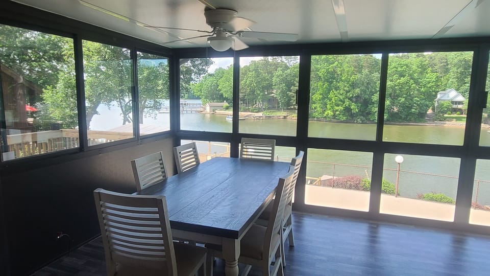 Sunroom Dining Area with nice lakefront views