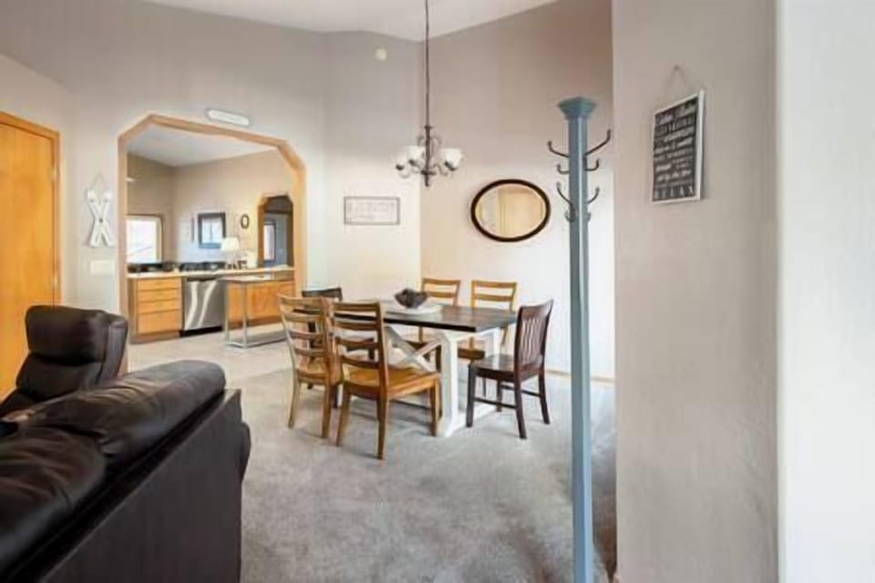 front entry, living room and dining table