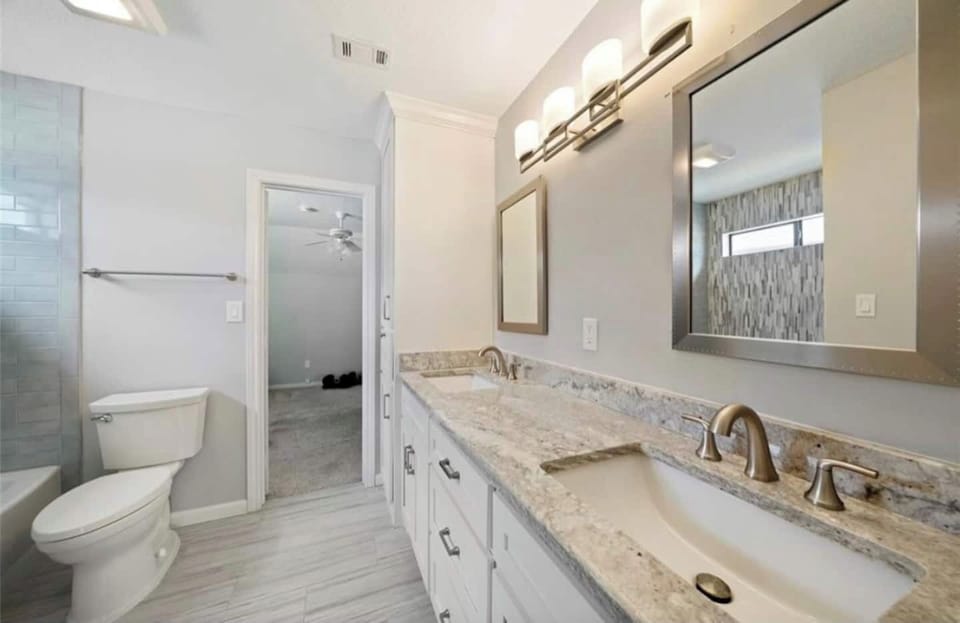 This beautiful jack and jill bathroom is shared between bedrooms 3 and 4. 