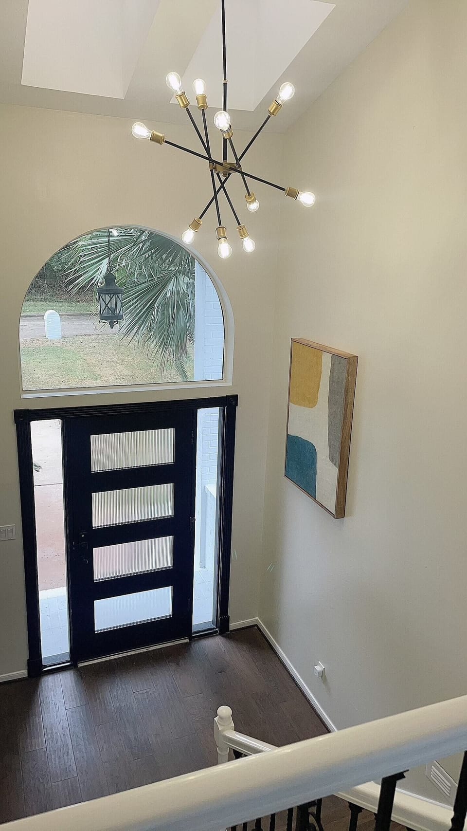 Front entryway.  There are nine steps to the front entry.  Upon entry, there is a landing with the option to go down 6 steps to the main living, kitchen, game room, or bedroom/bathroom 1.  Alternatively, guest can go up 6 steps to the commons area le