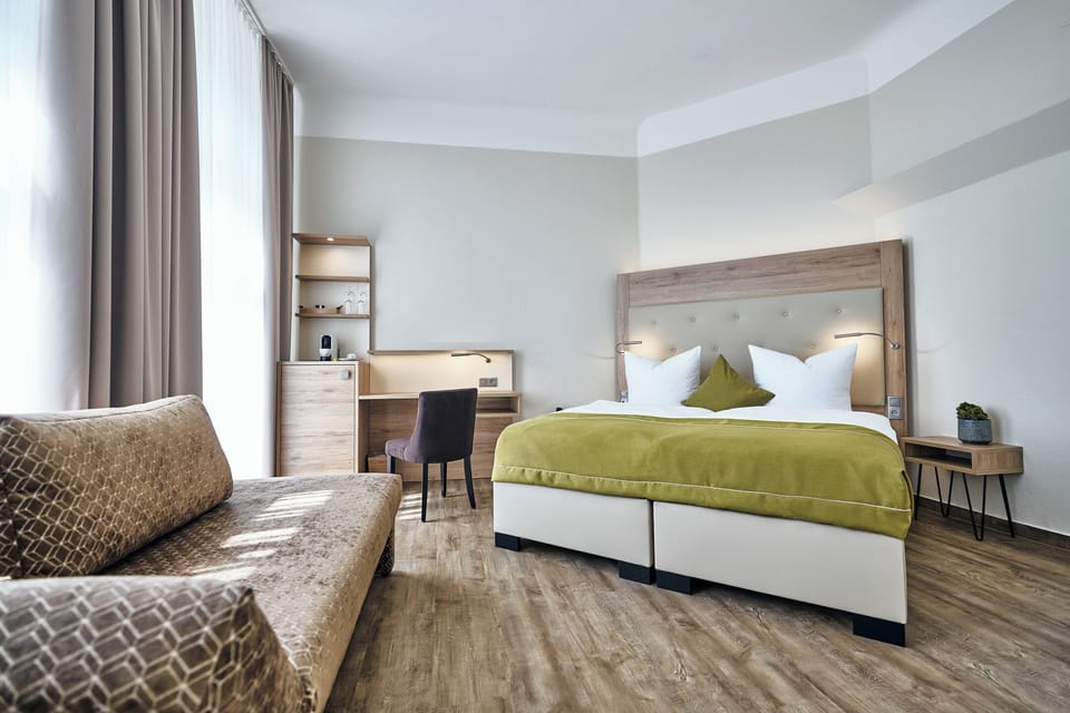 Superior Double Room, Lake View | Living area | 100-cm TV with satellite channels