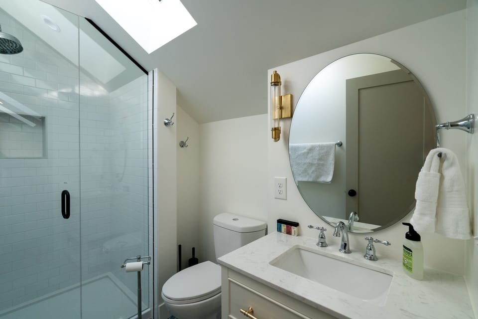 Enjoy the convenience of a walk-in shower in this well-appointed bathroom.
