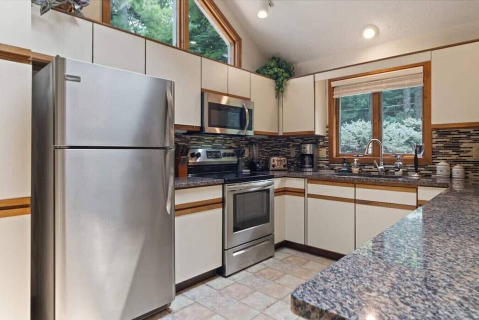 Well appointed kitchen with granite tops