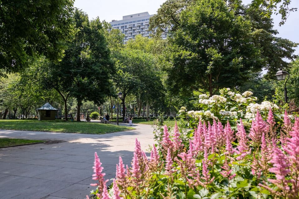 Tree-lined walking path just outside the property offering a calm urban retreat.