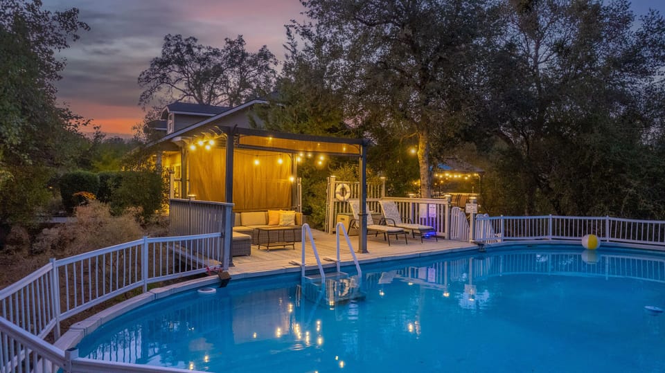 evening view of pool - pool not heated but can use area
