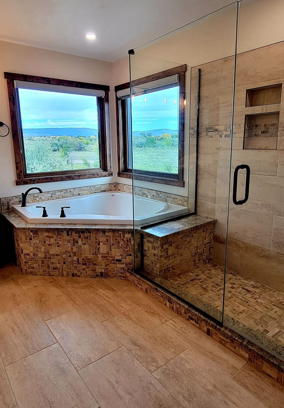Sunrise and mountain views! Large soaking tub with separate shower.