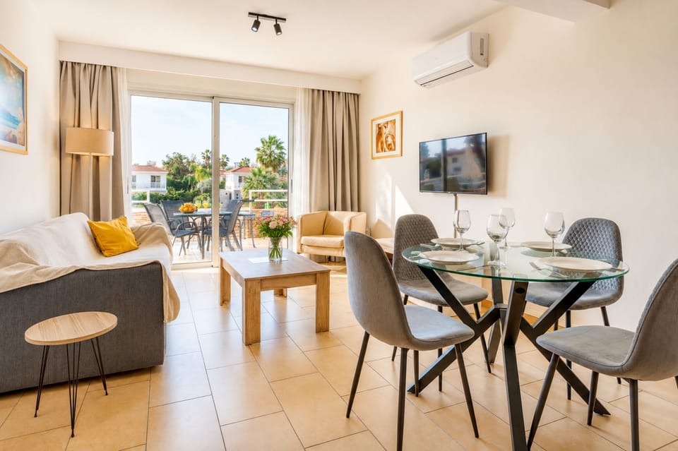 Superior Apartment, 1 Bedroom, Pool View | Living area | 43-inch Smart TV with satellite channels, TV