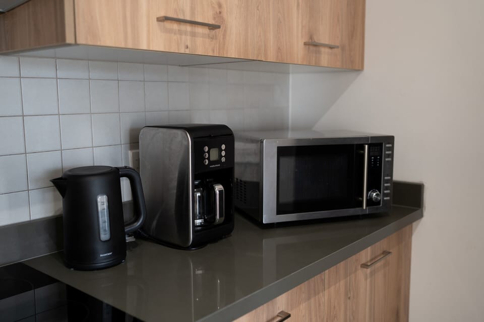 Superior Apartment, 1 Bedroom, Pool View | Private kitchen | Fridge, microwave, oven, stovetop