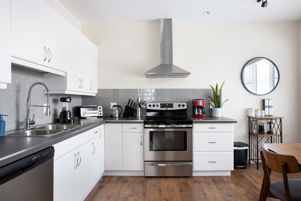 Bright, modern and well-stocked kitchen to prepare all meals.