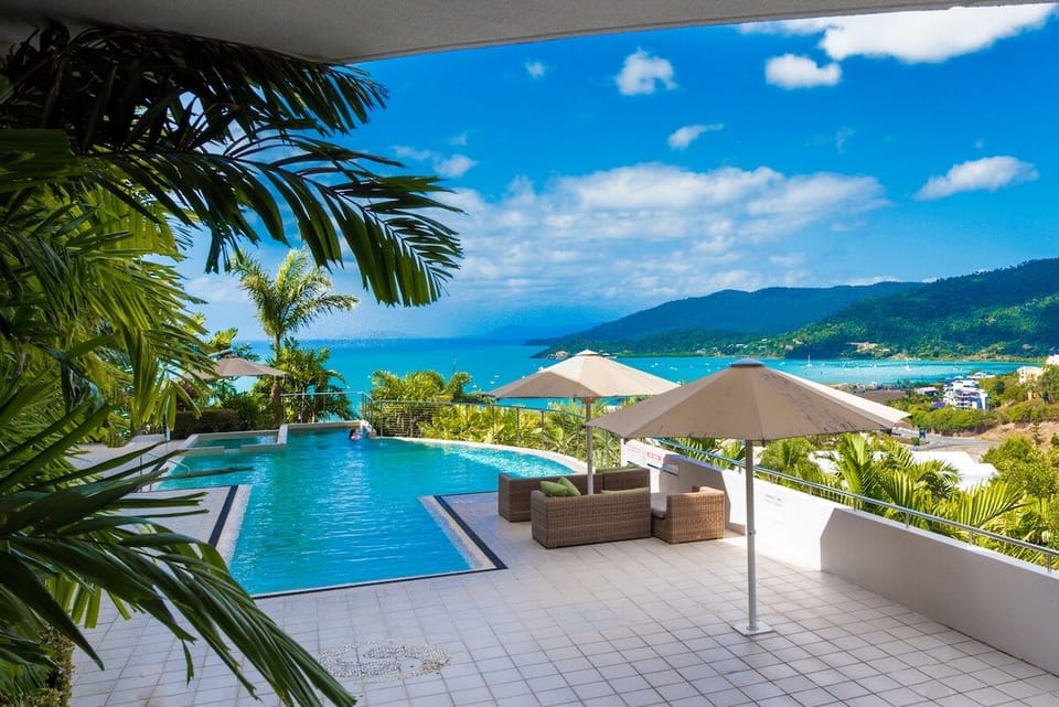 Take a refreshing dip in the stunning shared pool, where panoramic Coral Sea views, lush tropical greenery and sun loungers create an idyllic setting for soaking up the Whitsunday sunshine.