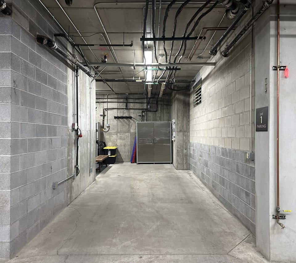 A dedicated parking spot in the heated garage. 