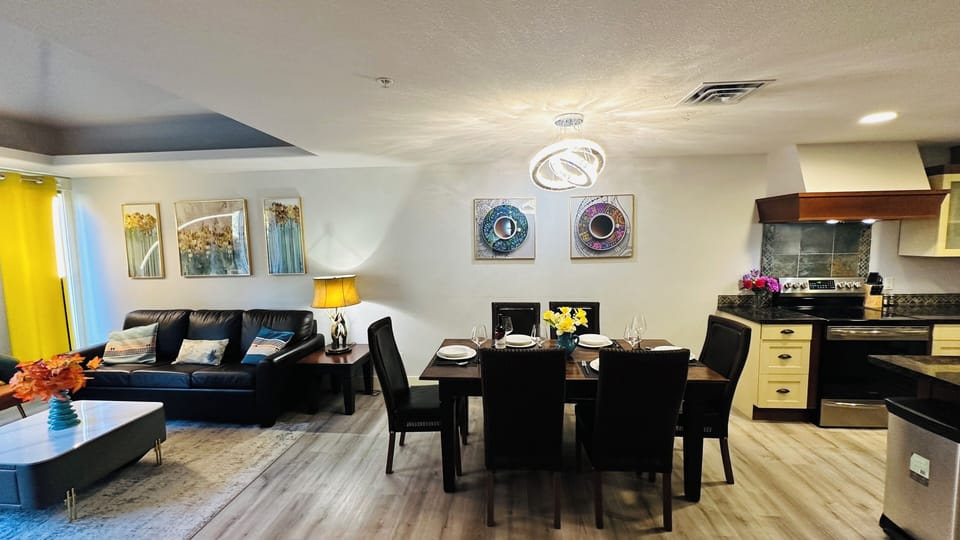 An elegant dining space adjacent to the kitchen, accommodating up to six guests