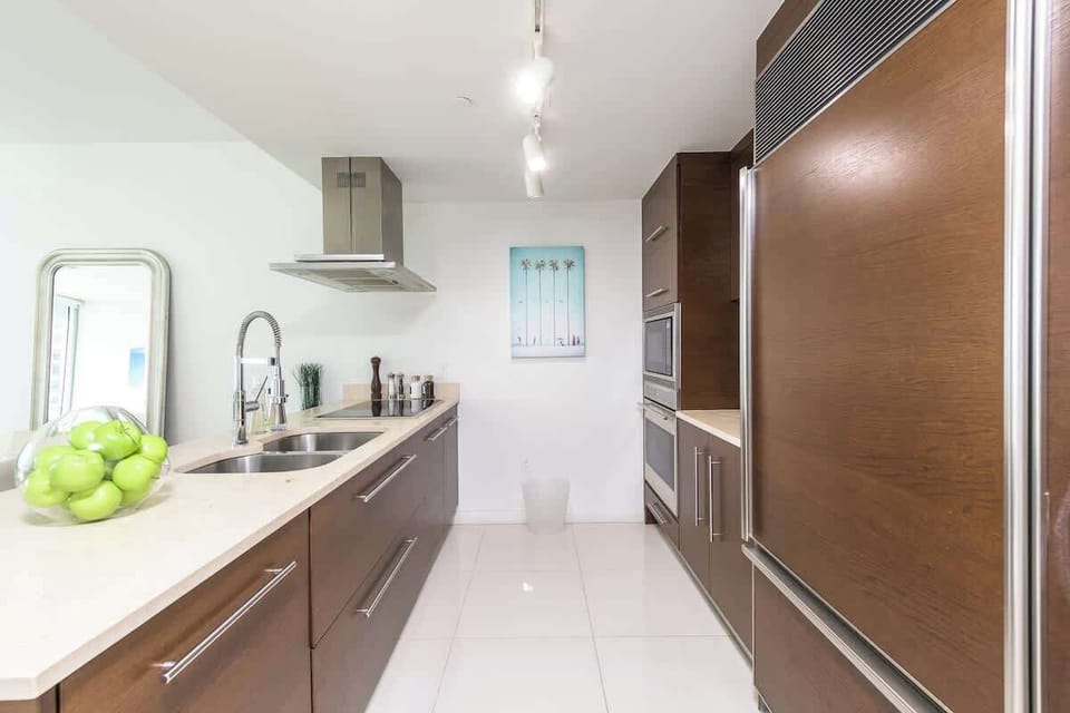 "Experience a modern Airbnb vacation rental with a stylish kitchen, stainless steel appliances, and bright open design — perfect for your city getaway."