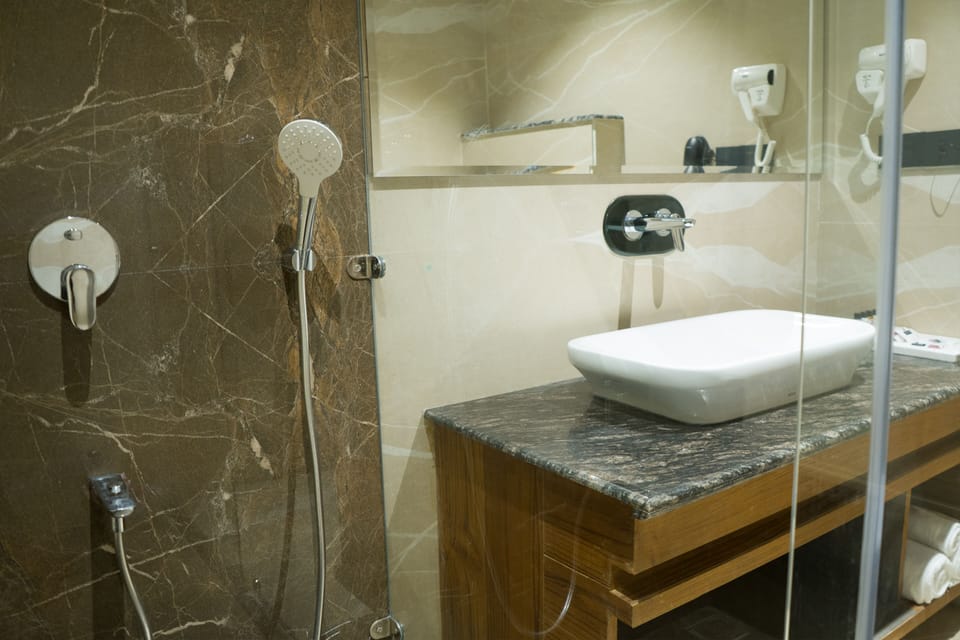 Standard Double Room | Bathroom | Shower, designer toiletries, hair dryer, towels