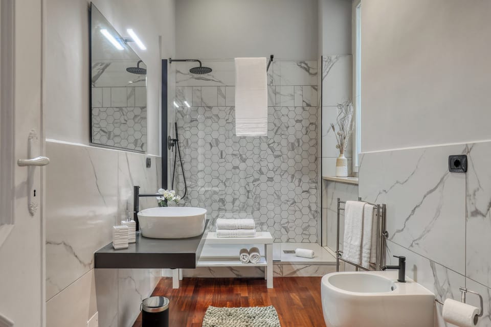 Apartment, 1 Bedroom, Patio | Bathroom amenities | Hair dryer, bidet, soap, shampoo