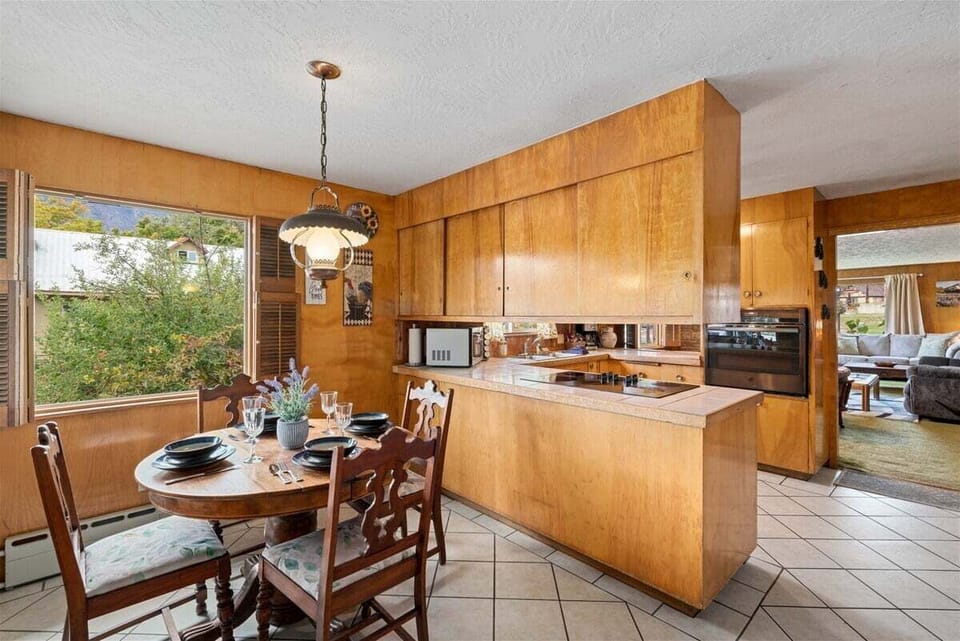 Large dining window lets in lots of natural light.